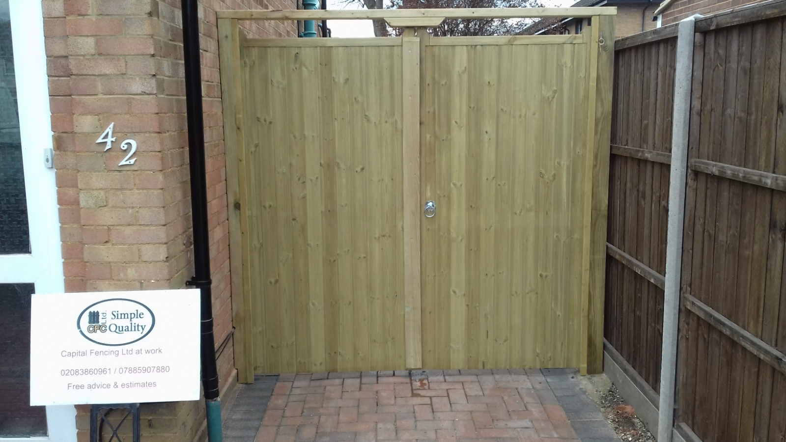 Tongue-and-groove double side gates in North London